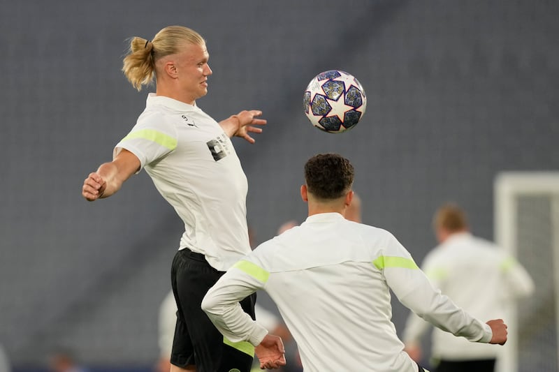 Manchester City's Erling Haaland, left, controls the ball during a training session at the Ataturk Olympic Stadium in Istanbul ahead of the Champions League final on Saturday. AP