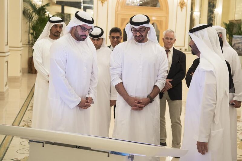 Sheikh Mohammed bin Zayed, Crown Prince of Abu Dhabi Deputy Supreme Commander of the Armed Forces, inspects a Dh 12 billion worth plan to develop the southern part of Yas Island, from Miral Asset Management Organisation, during a Sea Palace barza. Seen with Mohammed Al Mubarak, Chairman of Abu Dhabi Tourism and Culture Authority (L). Hamad Al Kaabi / Crown Prince Court - Abu Dhabi