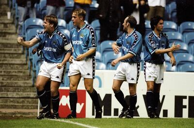 2 Sep 1998:  Celebration time for Manchester City during the Nationwide Division Two game against Walsall at Maine Road, Manchester, England. Man City won 3-1. \ Mandatory Credit: Alex Livesey /Allsport/Getty Images