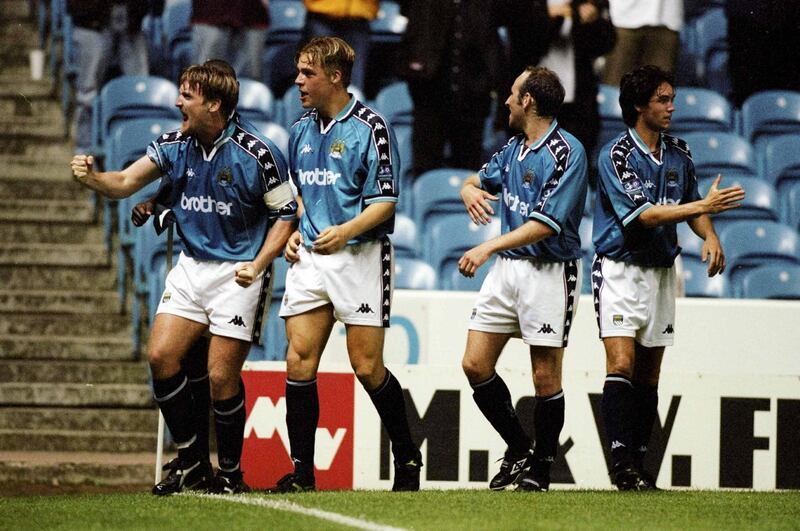 2 Sep 1998:  Celebration time for Manchester City during the Nationwide Division Two game against Walsall at Maine Road, Manchester, England. Man City won 3-1. \ Mandatory Credit: Alex Livesey /Allsport/Getty Images