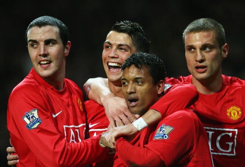 MANCHESTER, UNITED KINGDOM - MARCH 19:  Cristiano Ronaldo of Manchester United (2L) celebrates with team mates John O'Shea (L), Luis Nani (2R) and Nemanja Vidic (R) as he scores their second goal during the Barclays Premier League match between Manchester United and Bolton Wanderers at Old Trafford on March 19, 2008 in Manchester, England.  (Photo by Alex Livesey/Getty Images)