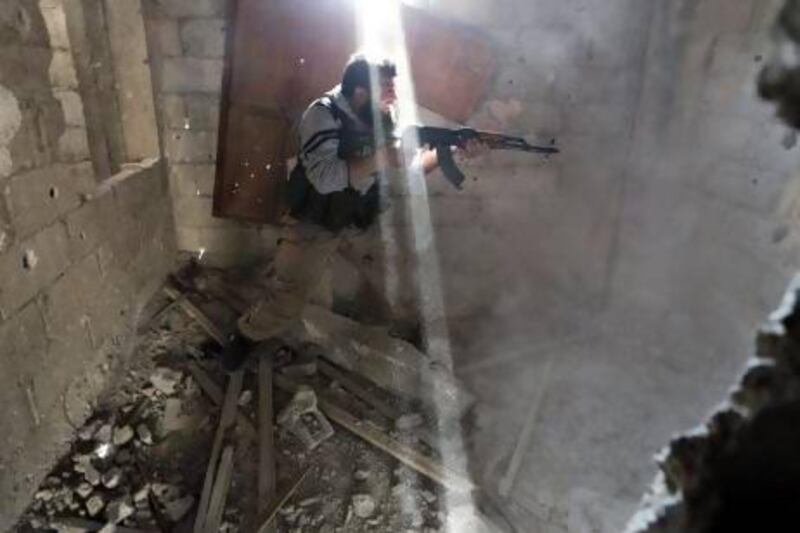 Heavy fighting continues in Syria. A fighter from the Free Syrian Army's Tahrir Al Sham brigade fires back at the Syrian army in Damascus.