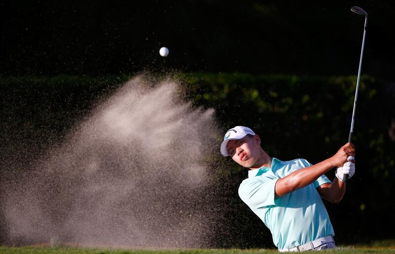 Chinese teenager Guan Tianlang has a large following on Twitter and on the course. Sam Greenwood / Getty Images

