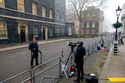 A television journalist stands outside 10 Downing Street ahead of Rishi Sunak, U.K. chancellor of the exchequer, presenting the budget statement in Parliament in London, U.K., on Wednesday, March 3, 2021. Sunak will extend furlough payments to U.K. workers until the end of September, protecting millions of people whose jobs were suspended during the coronavirus pandemic until after restrictions are set to be lifted. Photographer: Hollie Adams/Bloomberg