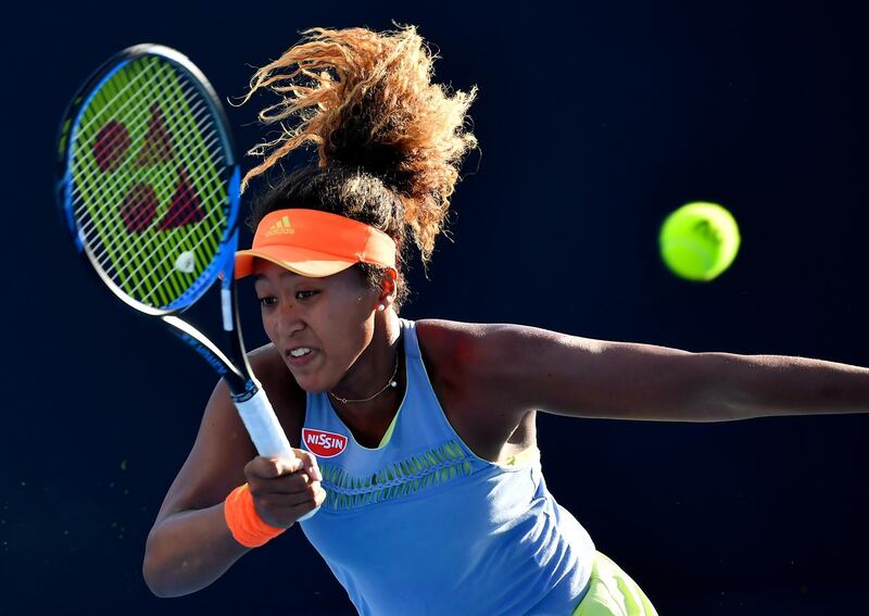 Naomi Osaka makes a forehand Kristina Kucova during their first round match. Andy Brownbill / AP Photo