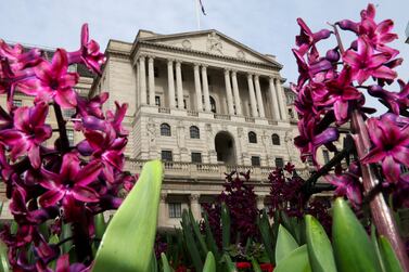 Spring flowers bloom in front of the Bank of England building in London. Reuters