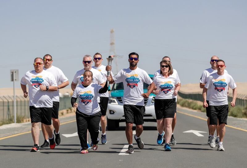 Abu Dhabi, United Arab Emirates, March 12, 2019.Special Olympics Torch Run Photo Opp at the Al Dhafrah Fort. 
Victor Besa/The National
Reporter:  Shireena Al Nuwais
Section:  NA