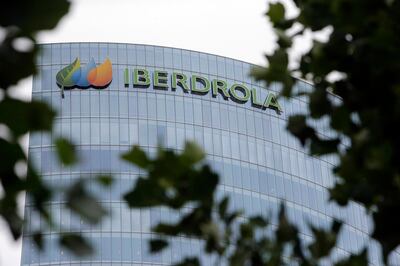 The logo of Iberdrola sits on display outside the headquarters of Iberdrola SA in Bilbao, Spain, on Tuesday, Aug. 4., 2015. Euskaltel, the phone and broadband carrier that operates in Spain's Basque region, surged in Madrid last month after it agreed to buy R Cable y Telecomunicaciones Galicia SA in a deal valued at 1.16 billion euros ($1.3 billion) to expand in the north of the country. Photographer: Pau Barrena/Bloomberg