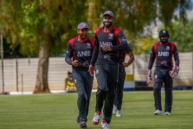 Spinner Ahmed Raza, centre, and captain Rohan Mustafa, left, will be back after serving suspensions. Courtesy of Johan Jooste