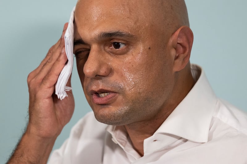 Mr Javid mops his brow while launching his campaign. Getty