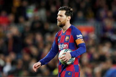 FILE PHOTO: Soccer Football - La Liga Santander - FC Barcelona v Real Sociedad - Camp Nou, Barcelona, Spain - March 7, 2020 Barcelona's Lionel Messi prepares to take a penalty REUTERS/Albert Gea/File Photo