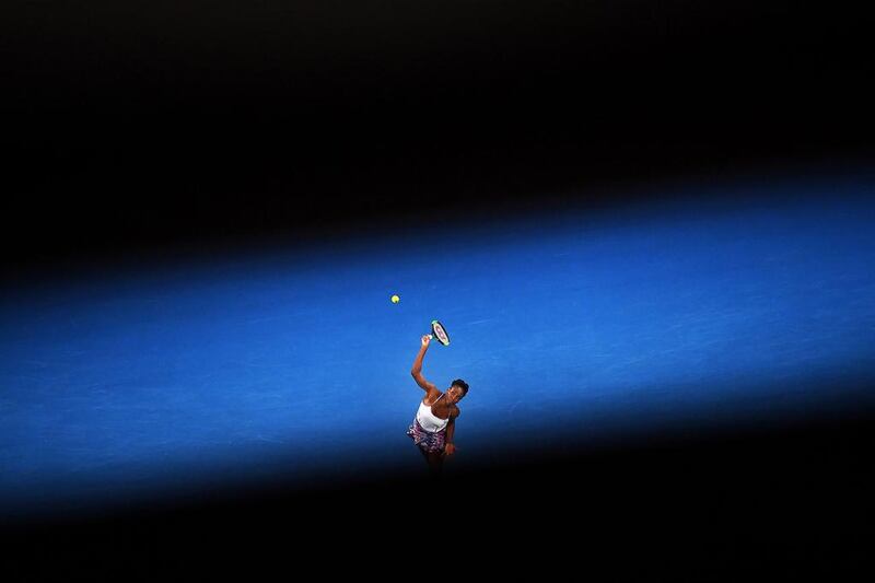 Venus Williams serves during the Australian Open final. Dean Lewins / EPA