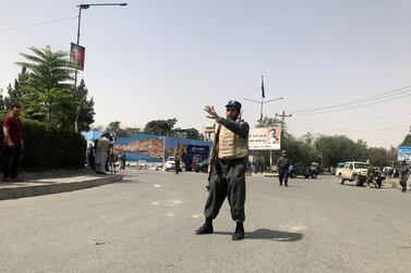 An Afghan policeman keeps watch near the site of a blast in Kabul, Afghanistan August 7, 2019. Reuters