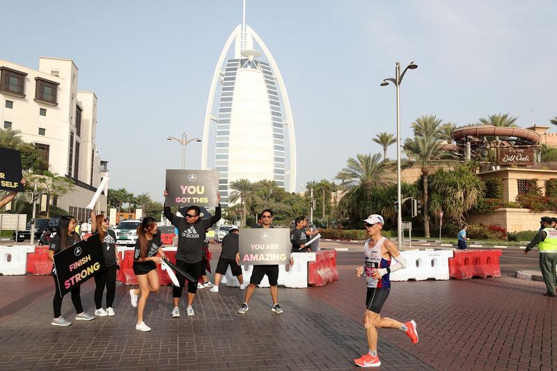 Dubai, United Arab Emirates - January 25, 2019: People run in the Standard Chartered Dubai Marathon 2019. Friday, January 25th, 2019 at Jumeirah, Dubai. Chris Whiteoak/The National