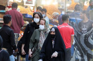 epa08532217 Iranian women wearing face masks go shopping around Tehran's grand bazaar in Tehran, Iran, 07 July 2020. Media reports state on 07 July 2020 that Iran recorded over 200 death cases from coronavirus disease (COVID-19) and more than 2,600 new cases diagnosed within a 24-hour period. EPA/ABEDIN TAHERKENAREH