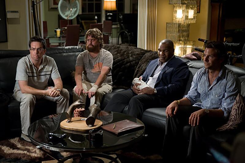 (L-r) Stu (ED HELMS), Alan (ZACH GALIFIANAKIS), MIKE TYSON and Phil (BRADLEY COOPER) watch the security surveillance footage from the night before in Warner Bros. Pictures' and Legendary Pictures' comedy "The Hangover," a Warner Bros. Pictures release.
PHOTOGRAPHS TO BE USED SOLELY FOR ADVERTISING, PROMOTIONAL, PUBLICITY OR REVIEWS OF THIS SPECIFIC MOTION PICTURE AND TO REMAIN THE PROPERTY OF THE STUDIO. NOT FOR SALE OR REDISTRIBUTION.