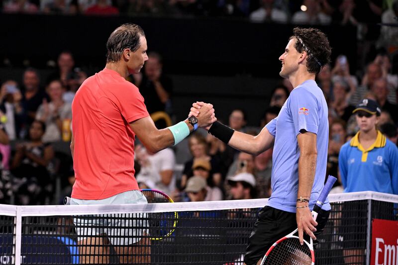 Rafael Nadal shakes hands with Austria's Dominic Thiem after their match. AFP