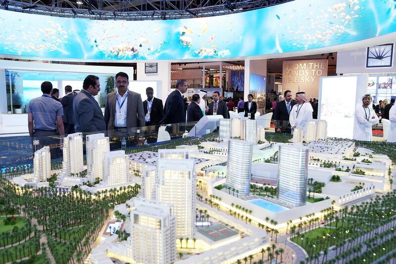 Visitors view mock ups of Nakheel projects Cityscape Global. Pawan Singh / The National
