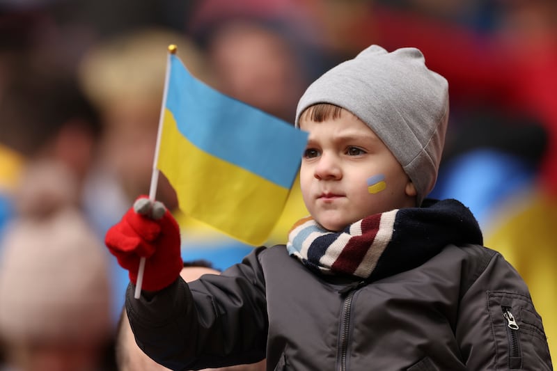 A young Ukrainian fan before the game. AP 