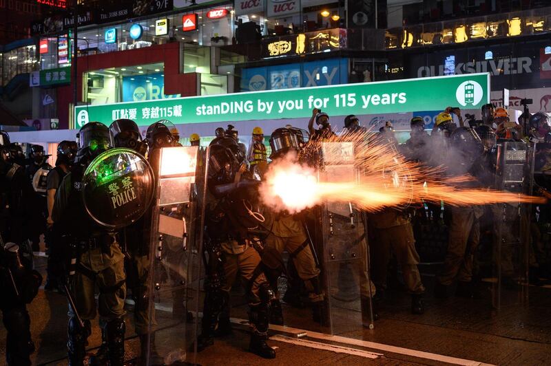 Police fire tear gas at Causeway Bay district in Hong Kong on August 31.  AFP