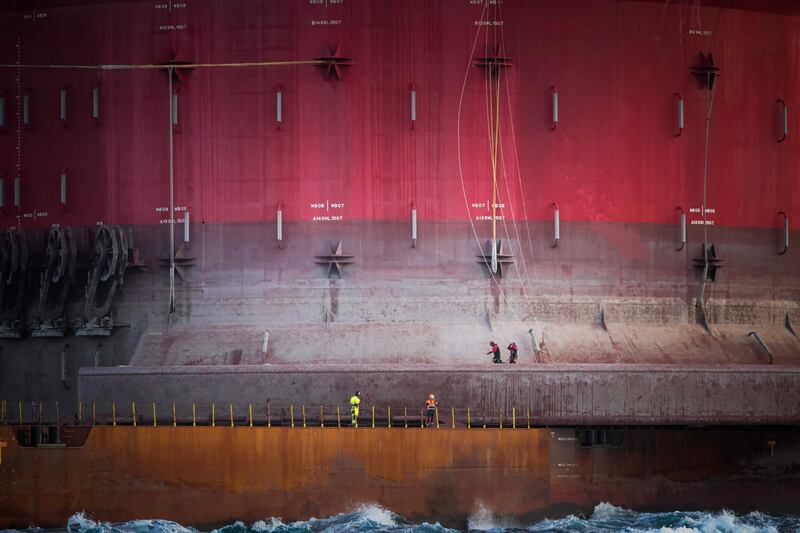 Greenpeace activists during a protest on a Shell platform on its way to the North Sea to expand an existing oil and gas field. AFP

