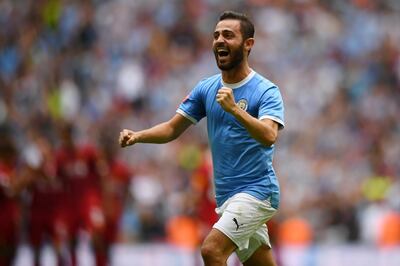 LONDON, ENGLAND - AUGUST 04: Bernardo Silva of Manchester City  celebrates following his team's victory in the penalty shoot out during the FA Community Shield match between Liverpool and Manchester City at Wembley Stadium on August 04, 2019 in London, England. (Photo by Clive Mason/Getty Images)