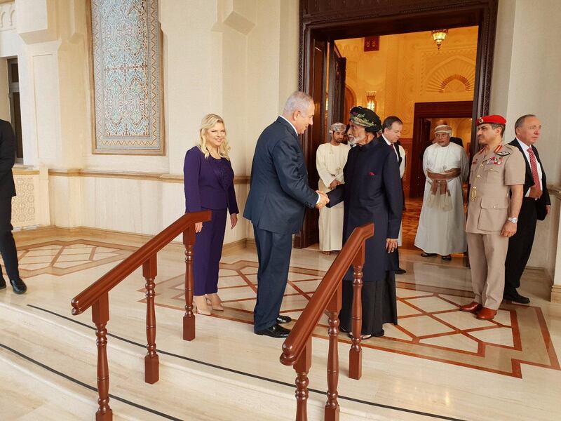 Sultan Qaboos shakes hands with Mr. Netanyahu in Muscat. Reuters