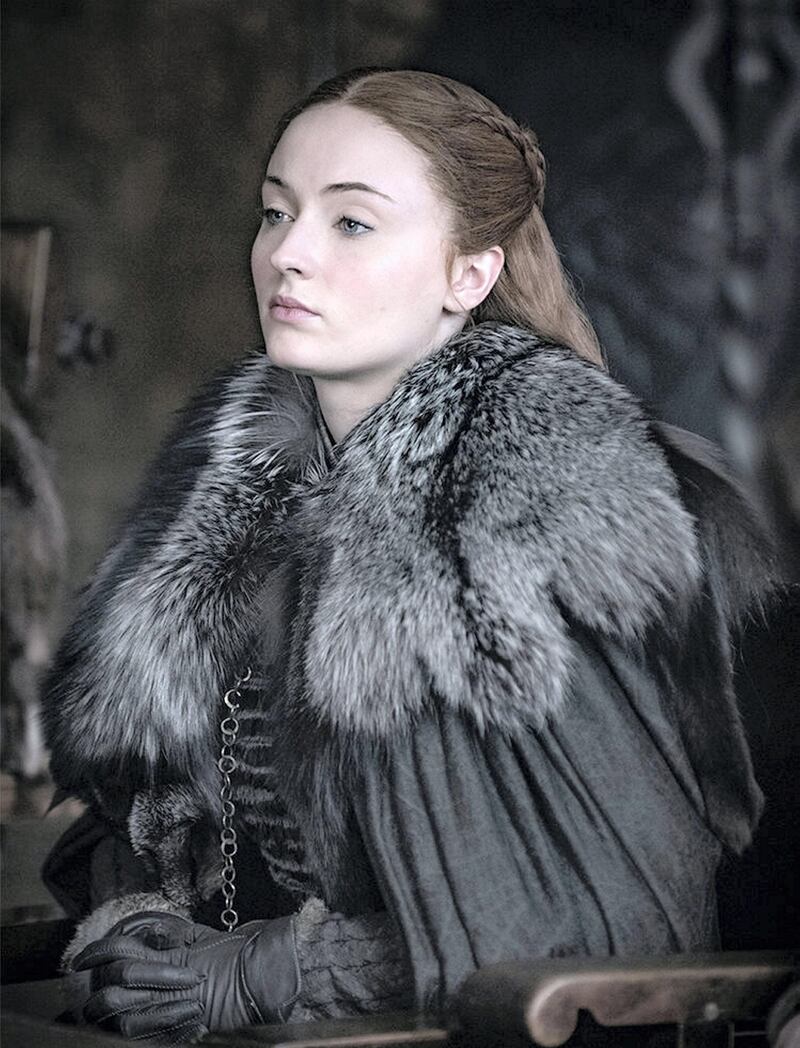 Sophie Turner, who plays Sansa Stark in 'Game of Thrones', has revealed she is happy to be paid less than co-star Kit Harington. Courtesy HBO