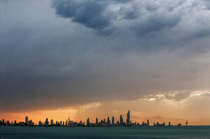 The Sun sets over Kuwait City. AFP