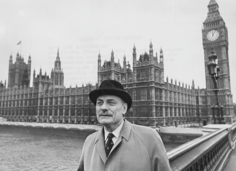 Controversial politician Enoch Powell pictured on Westminster Bridge in view of the Houses of Parliament as he prepares to return to the House of Commons following his resignation from the Conservative Party, London, October 23rd 1975. (Photo by Roger Jackson/Central Press/Getty Images)