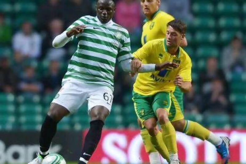 Victor Wanyama, left, in action for Celtic against Norwich City during a friendly on Wednesday. Mark Runnacles / Getty Images