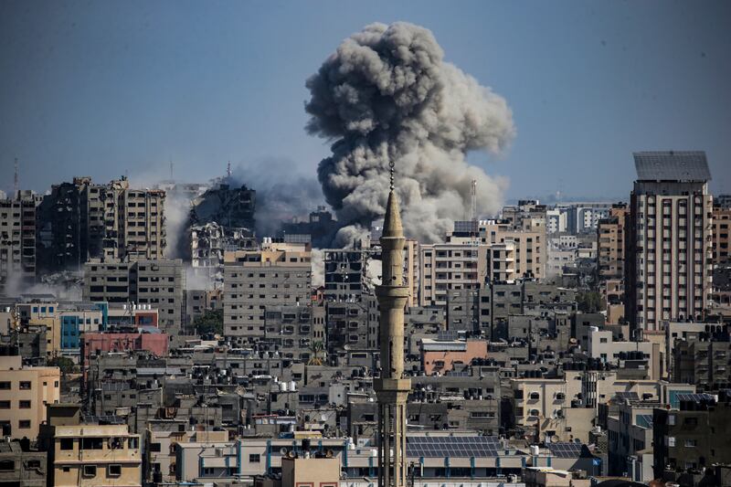 Smoke rises following Israeli strikes in Gaza on Sunday. EPA
