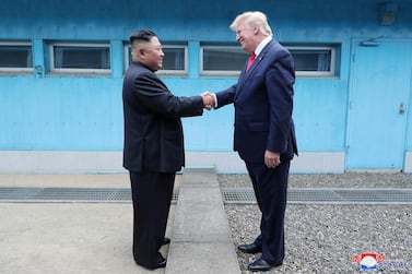 US President Donald Trump with North Korean leader Kim Jong-un in the DMZ separating the two Koreas, Panmunjom. KCNA via Reuters