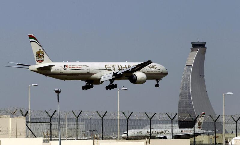 The evacuees were brought to Abu Dhabi from China on an Etihad plane. Kamran Jebreili / AP Photo