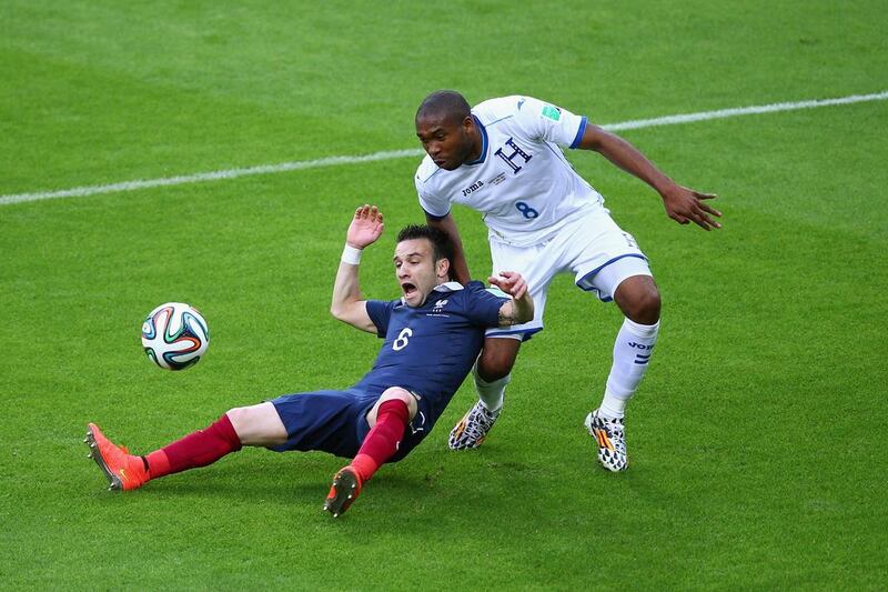 Mathieu Valbuena of France competes for the ball with Wilson Palacios of Honduras during their World Cup 2014 Group E match on Sunday. Paul Gilham / Getty Images