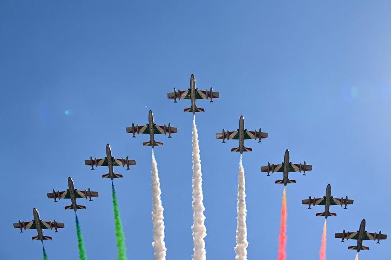 Italian Airforce jets fly over the track. AFP