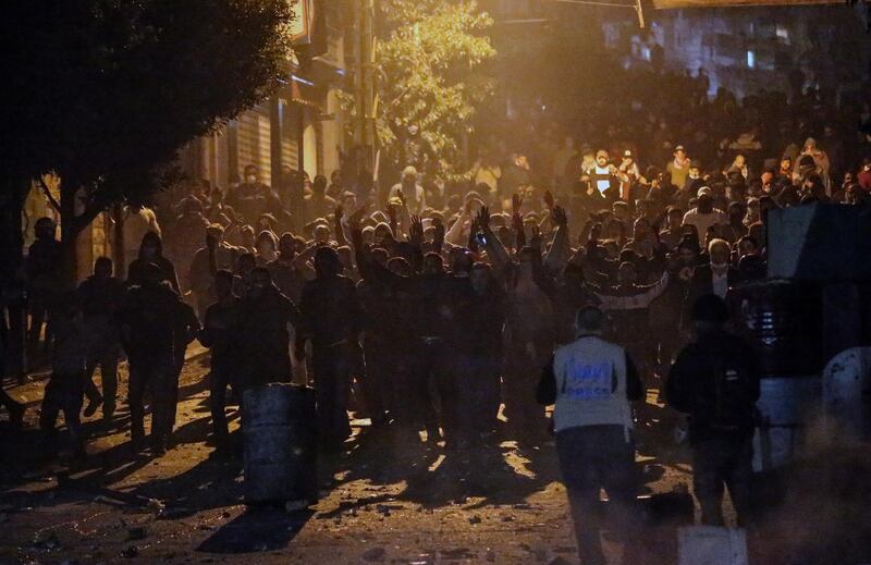 Demonstrators in action during a protest against the newly appointed Lebanese Prime Minister Hassan Diab, at Corniche Al-Mazraa neighborhood in Beirut, Lebanon.  EPA