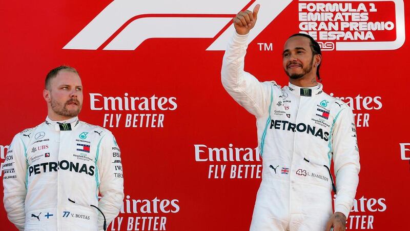Lewis Hamilton on the top step of the podium after winning the Spanish Grand Prix in May. Reuters