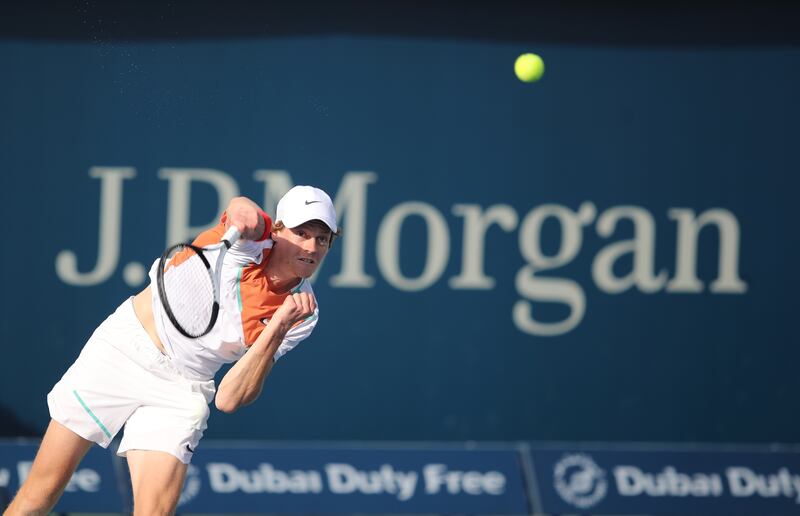Jannik Sinner serves to Andy Murray during their second round match at the Dubai Duty Free Tennis Championships. EPA