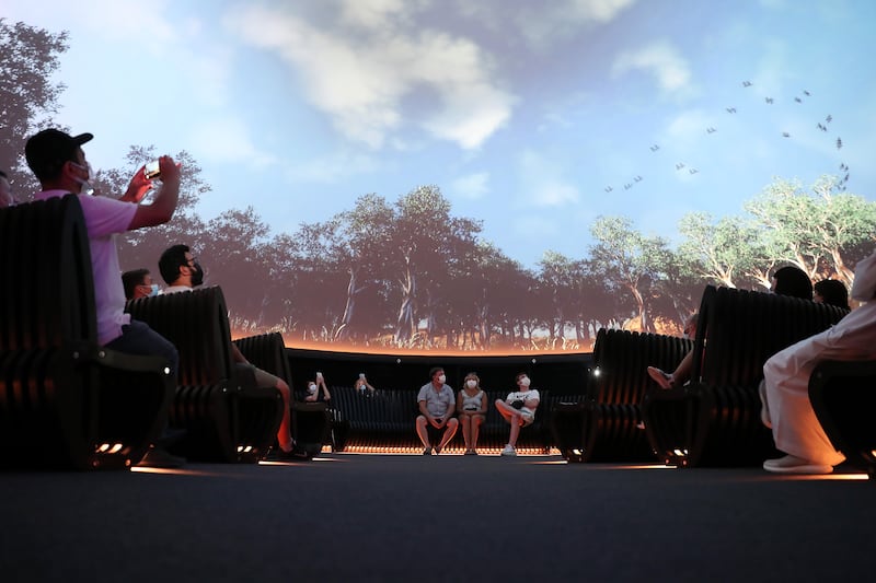 Visitors to the Australia Pavilion enjoy the audio-visual show