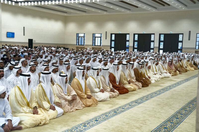 ABU DHABI, UNITED ARAB EMIRATES -June 04, 2019: HH Sheikh Mohamed bin Zayed Al Nahyan, Crown Prince of Abu Dhabi and Deputy Supreme Commander of the UAE Armed Forces (15th L), attends Eid Al Fitr prayers at Sheikh Sultan bin Zayed The First mosque. Seen with HH Sheikh Khalifa bin Sultan bin Khalifa bin Zayed Al Nahyan (L), HH Sheikh Mohamed bin Sultan bin Khalifa Al Nahyan (2nd L), HH Sheikh Sultan bin Saeed bin Mohamed Al Nahyan (3rd L), HH Sheikh Abdullah bin Mohamed bin Khaled Al Nahyan (6th L), HH Sheikh Nahyan bin Mubarak Al Nahyan, UAE Minister of State for Tolerance (7th L), HH Sheikh Khaled bin Zayed Al Nahyan, Chairman of the Board of Zayed Higher Organization for Humanitarian Care and Special Needs (ZHO) (8th L), HH Sheikh Omar bin Zayed Al Nahyan, Deputy Chairman of the Board of Trustees of Zayed bin Sultan Al Nahyan Charitable and Humanitarian Foundation (9th L), HH Sheikh Hamed bin Zayed Al Nahyan, Chairman of the Crown Prince Court of Abu Dhabi and Abu Dhabi Executive Council Member (10th L), HH Sheikh Mansour bin Zayed Al Nahyan, UAE Deputy Prime Minister and Minister of Presidential Affairs (11th L), HH Sheikh Nahyan Bin Zayed Al Nahyan, Chairman of the Board of Trustees of Zayed bin Sultan Al Nahyan Charitable and Humanitarian Foundation (12th L), HH Sheikh Hazza bin Zayed Al Nahyan, Vice Chairman of the Abu Dhabi Executive Council (13th L), HE Shaykh Abdallah bin Bayyah (14th L), HH Sheikh Suroor bin Mohamed Al Nahyan (16th L), HH Sheikh Saeed bin Zayed Al Nahyan, Abu Dhabi Ruler's Representative (17th L), HH Lt General Sheikh Saif bin Zayed Al Nahyan, UAE Deputy Prime Minister and Minister of Interior (18th L), HH Sheikh Tahnoon bin Zayed Al Nahyan, UAE National Security Advisor (19th L) and other dignitaries.

( Hamad Al Mansouri / Ministry of Presidential Affairs )
---