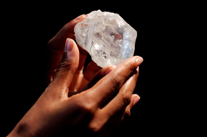 FILE PHOTO: A model displays the 1109 carat "Lesedi La Rona" diamond at Sotheby's in the Manhattan borough of New York, U.S. on May 4, 2016. REUTERS/Lucas Jackson/File Photo