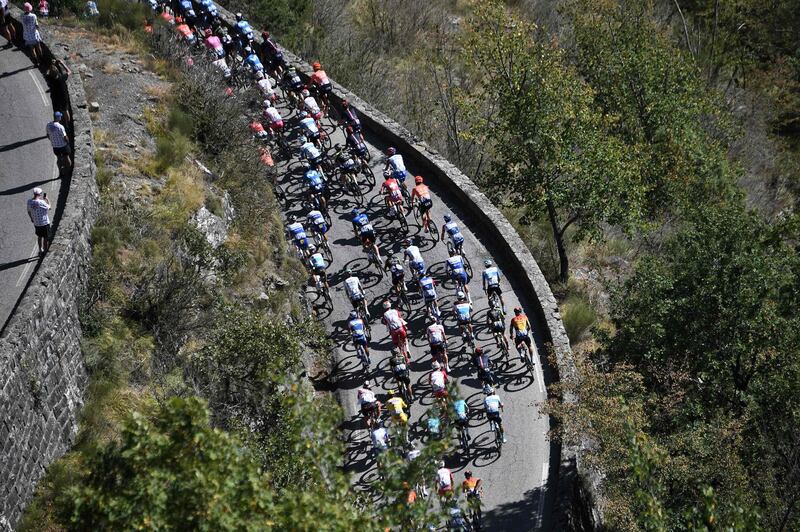 The pack rides along the Col de Turini during Stage 2