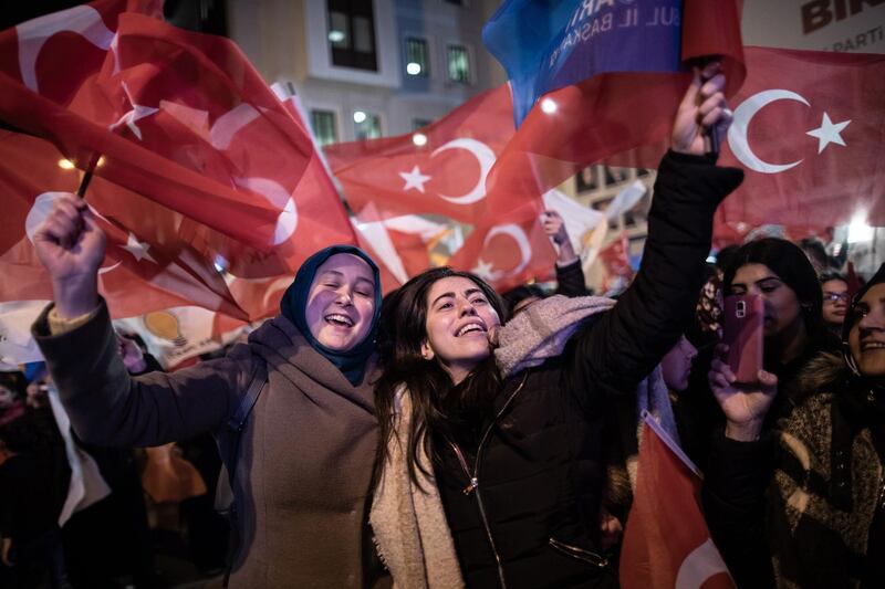 Supporters of the AKP celebrate early results in Istanbul. EPA