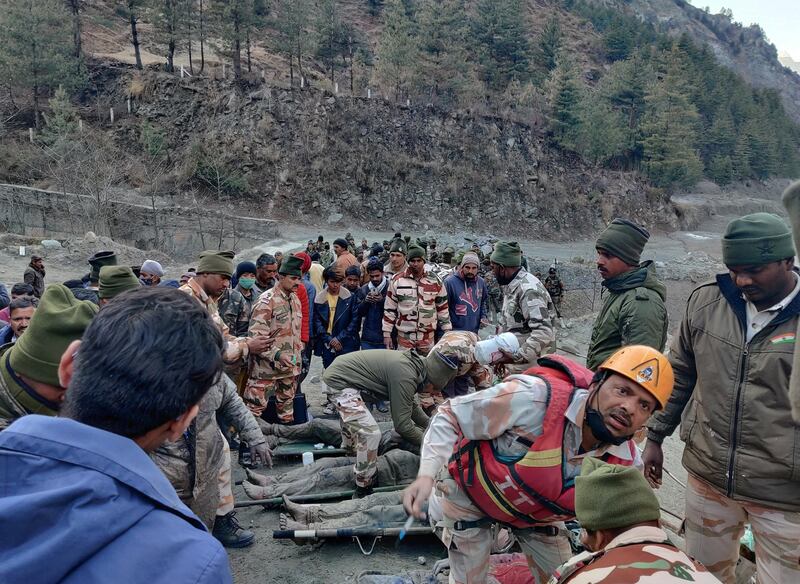 Members of the Indo-Tibetan Border Police tend to people rescued in Tapovan after a Himalayan glacier collapsed and caused flash flooding in Uttarakhand state. Reuters