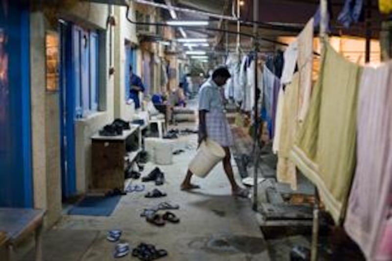 Outside the workers accommodations in a labour camp on July 17, 2008.