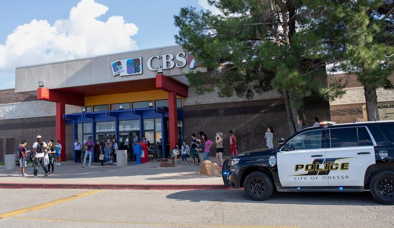 Odessa police officers park their vehicle outside Music City Mall in Odessa, Texas as they investigate areas following a deadly shooting in the area of Odessa and Midland. Several people were dead after a gunman who hijacked a postal service vehicle in West Texas shot more than 20 people, authorities said Saturday. The gunman was killed and a few law enforcement officers were among the injured. AP