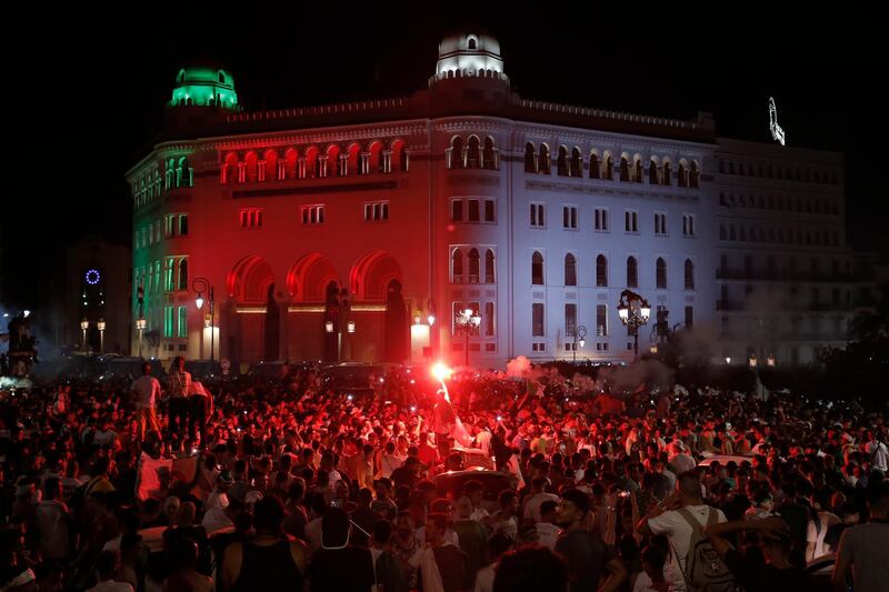Algerian fans celebrate their national soccer team's 1-0 victory over Senegal in Africa's Cup of Nations final, in Algiers. AP