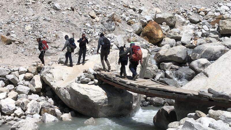 Oscar Pacheco's party crosses a bridge on their way from Lobuche to Gorakshep, at around 4,990 metres. 