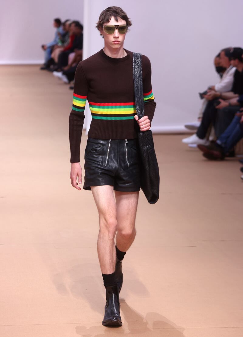 For the Prada spring/summer 2023 menswear collection, horizontal stripes and leather shorts feature heavily. Photo: EPA